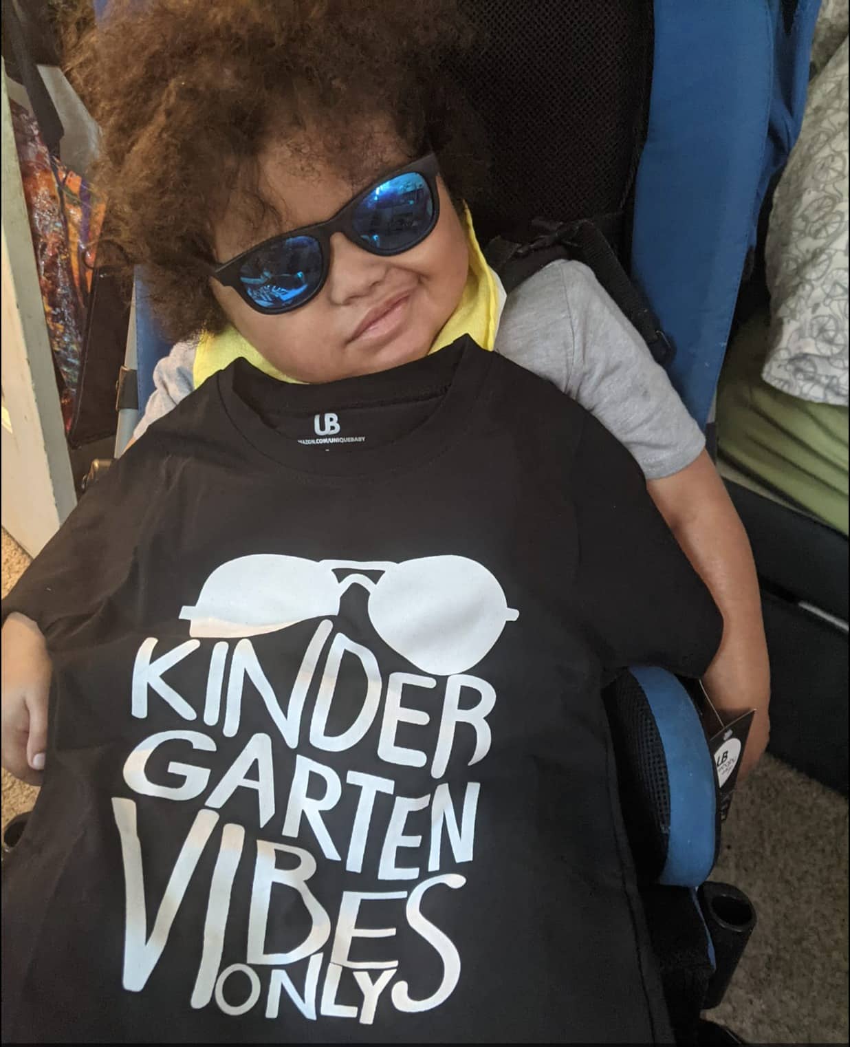 Jett with a Kindergarten Vibes shirt